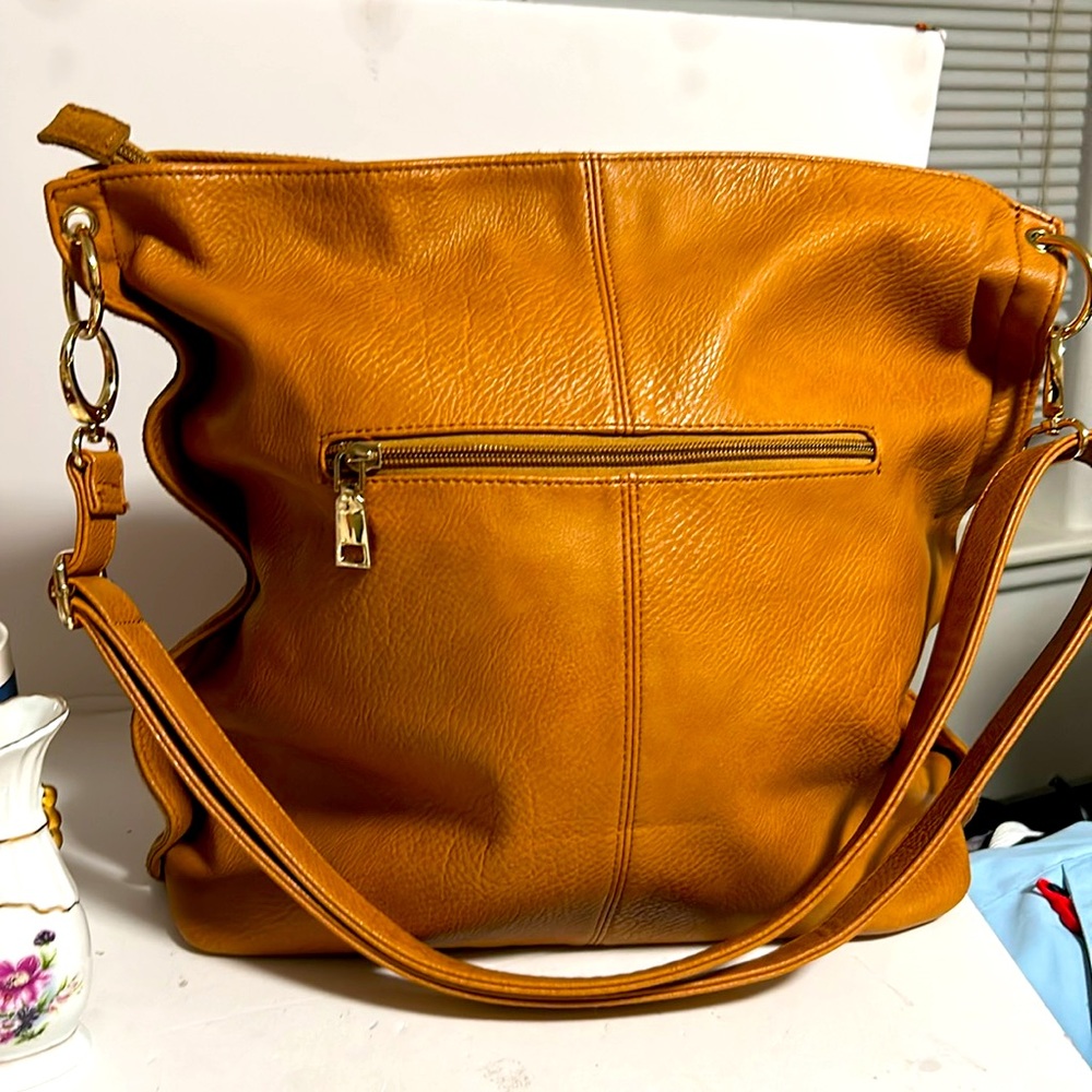 Excellent condition purse one side leather other side suede